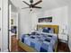 Well-lit bedroom with a view into the living room and complemented by hardwood floors at 215 Piedmont Ne Ave # 2109, Atlanta, GA 30308