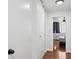 Bright hallway featuring hardwood floors and access to bedroom with city view at 215 Piedmont Ne Ave # 2109, Atlanta, GA 30308