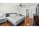 Spacious main bedroom with hardwood floors, ceiling fan, and neutral color palette at 215 Piedmont Ne Ave # 2109, Atlanta, GA 30308