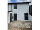 The backyard features a patio and access through black framed doors and windows, enhancing outdoor enjoyment at 3505 Miller St # D, Lithia Springs, GA 30122