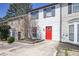 Attractive townhome with stone accents and a blooming tree in the front yard at 3505 Miller St # D, Lithia Springs, GA 30122