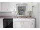 Classic kitchen showcasing white cabinetry, hardwood floors, and modern fixtures at 3505 Miller St # D, Lithia Springs, GA 30122