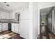 Well-maintained kitchen featuring white appliances and hardwood floors at 3505 Miller St # D, Lithia Springs, GA 30122