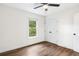 Bedroom featuring wood-look flooring, natural light, and a closet at 578 Cedar Avenue, Atlanta, GA 30318