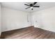 A well lit bedroom featuring wood-look floors and a ceiling fan at 578 Cedar Avenue, Atlanta, GA 30318