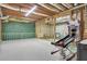 Unfinished basement featuring ping pong space, basketball game, and exposed ductwork at 1112 Kensington Ct, Johns Creek, GA 30022