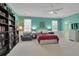 Large bedroom with sitting area and ensuite bathroom at 1112 Kensington Ct, Johns Creek, GA 30022