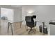 Bright office featuring a glass-top desk and modern decor at 1112 Kensington Ct, Johns Creek, GA 30022