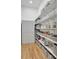 Well-organized pantry with ample shelving and storage space at 1112 Kensington Ct, Johns Creek, GA 30022