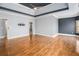 Expansive main bedroom with tray ceiling, hardwood floors, and ample natural light at 117 Olde Heritage Way, Woodstock, GA 30188