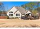 Spacious backyard with a large deck area, perfect for outdoor entertaining and relaxation at 340 Housman Dr, Fayetteville, GA 30215