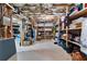 Unfinished basement has open shelving, storage, and laundry hookups at 340 Housman Dr, Fayetteville, GA 30215