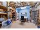 Unfinished basement featuring exposed ceiling, work space, and storage at 340 Housman Dr, Fayetteville, GA 30215