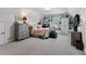 Bright bedroom with a vaulted ceiling, built-in shelves, and window seat overlooking the yard at 340 Housman Dr, Fayetteville, GA 30215