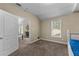 Another view of the bedroom showing natural light and easy access to other rooms at 340 Housman Dr, Fayetteville, GA 30215