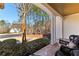 Charming covered front porch with comfortable seating and a view of the landscaped front yard at 340 Housman Dr, Fayetteville, GA 30215