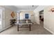 An inviting game room boasts a ping pong table and comfortable carpet at 340 Housman Dr, Fayetteville, GA 30215