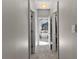 Hallway with a view of a soaking tub and natural light at 340 Housman Dr, Fayetteville, GA 30215