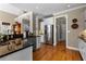 Bright kitchen featuring granite countertops and stainless steel appliances at 340 Housman Dr, Fayetteville, GA 30215