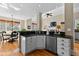 Modern kitchen with white cabinets and a stainless steel dishwasher at 340 Housman Dr, Fayetteville, GA 30215