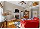 Inviting living room boasts a fireplace, vaulted ceiling, and abundant natural light at 340 Housman Dr, Fayetteville, GA 30215