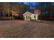 Backyard outbuilding with double doors and stylish lighting, creating a welcoming ambiance at 340 Housman Dr, Fayetteville, GA 30215