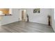 View of an open-concept living room with hardwood floors and light neutral-painted walls at 3665 Chestnut Dr # A2, Atlanta, GA 30340