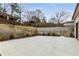 Spacious backyard with patio, retaining walls, and landscaping at 591 E Morningside Ne Dr, Atlanta, GA 30324