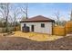 Private backyard featuring a storage shed, pea gravel and wood fencing at 591 E Morningside Ne Dr, Atlanta, GA 30324