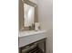 This bathroom features a decorative mirror, sink, and vanity at 591 E Morningside Ne Dr, Atlanta, GA 30324