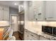 The sleek stainless steel appliances and bright white cabinetry make this kitchen a dream at 591 E Morningside Ne Dr, Atlanta, GA 30324