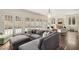 Bright and inviting living room with hardwood floors, a fireplace, and French doors at 591 E Morningside Ne Dr, Atlanta, GA 30324