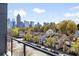 Relax on this balcony and take in stunning views of the city skyline and charming neighborhood homes below at 223 16Th Nw St # 8, Atlanta, GA 30363