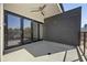 Spacious balcony with a ceiling fan and sliding glass doors, perfect for enjoying the views and outdoor living at 223 16Th Nw St # 8, Atlanta, GA 30363