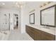 Luxury bathroom with a double vanity, mirrors, a soaking tub, and a glass enclosed shower at 223 16Th Nw St # 8, Atlanta, GA 30363