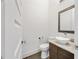 Well-lit powder room with marble vanity and modern fixtures at 223 16Th Nw St # 8, Atlanta, GA 30363