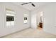Bright bedroom with ensuite bathroom and large windows at 223 16Th Nw St # 8, Atlanta, GA 30363