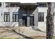 Modern townhome entrance with stylish doors and contemporary architectural details at 223 16Th Nw St # 8, Atlanta, GA 30363