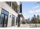 Stylish townhome building with a modern design, set against a vibrant cityscape at 223 16Th Nw St # 8, Atlanta, GA 30363