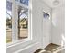 Bright foyer with a window that offers pleasant street view and a tiled decor window above the door at 223 16Th Nw St # 8, Atlanta, GA 30363
