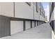 Attached garage parking with multiple white garage doors, offering convenience and security for residents at 223 16Th Nw St # 8, Atlanta, GA 30363