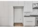 Modern kitchen featuring lots of storage, stainless appliances, and marble backsplash at 223 16Th Nw St # 8, Atlanta, GA 30363