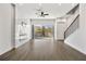 Bright living room features a fireplace, ceiling fan and a wall of windows at 223 16Th Nw St # 8, Atlanta, GA 30363