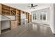 Spacious living room with a modern built-in entertainment center and large windows at 223 16Th Nw St # 8, Atlanta, GA 30363