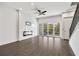 Spacious living room with wood floors, fireplace and access to outdoor balcony at 223 16Th Nw St # 8, Atlanta, GA 30363