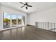 Upstairs living room with a balcony features dark hardwood floors at 223 16Th Nw St # 8, Atlanta, GA 30363