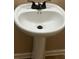 Pedestal sink in bathroom with modern fixtures at 4155 Park Chase Dr, Atlanta, GA 30344
