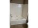 Clean, neutral bathtub and shower combination at 4155 Park Chase Dr, Atlanta, GA 30344