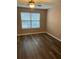 Bedroom with natural light, showcasing the hardwood floor and ample lighting at 4155 Park Chase Dr, Atlanta, GA 30344