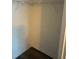Empty closet features rack and shelf, offering essential storage at 4155 Park Chase Dr, Atlanta, GA 30344